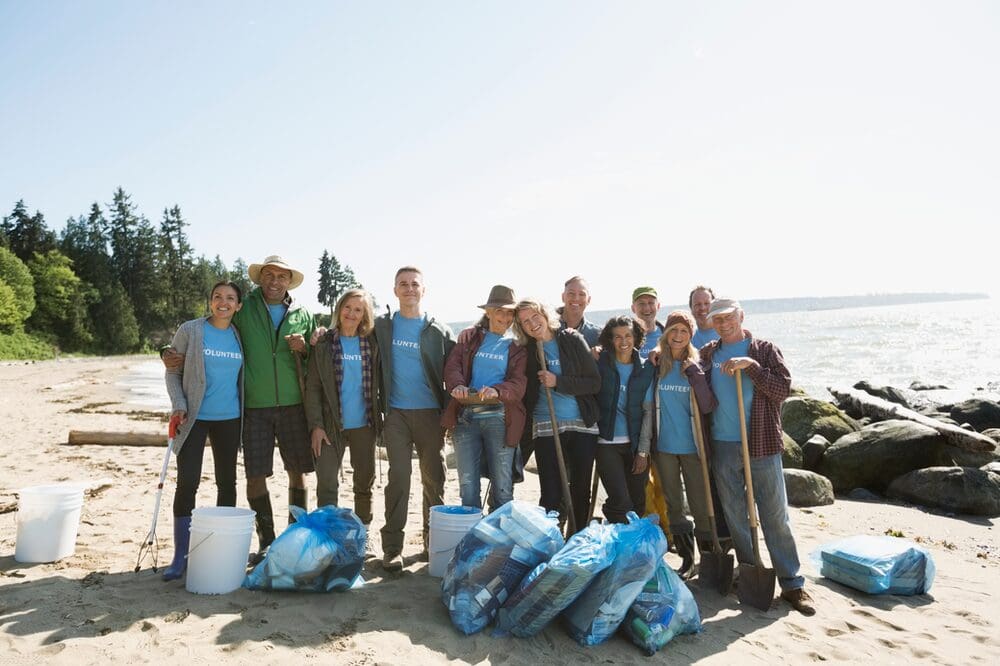 volunteers at a beach clean event