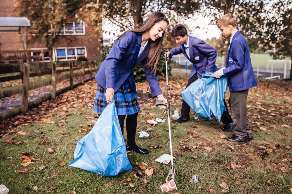 School children doing a litter pick