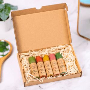 A natural lip balm gift set with five balms in paper tubes.